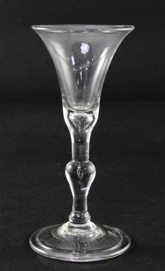 A Light baluster wine glass, c.1730, 15cm